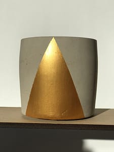 Concrete pot with gold triangle
