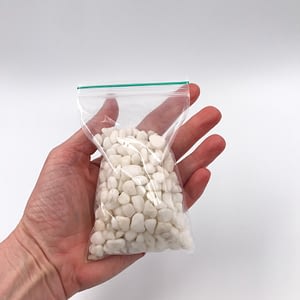 White terrarium gravel in a bag