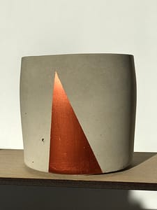 Concreate pot with red triangle